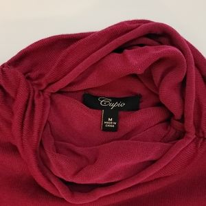 A medium fushia mock neck sweater by Cupio.